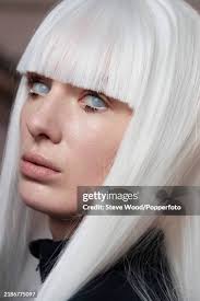 Model Heather Jeffery wears a pair of two tone red and orange... News Photo 