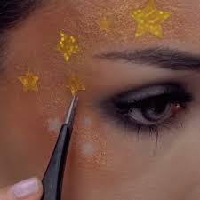 My inspiration for creating this look was the aesthetic of the . Stars Face Paint Gif Stars Face Paint Painting Face Discover Share Gifs