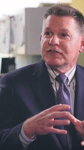 Peyton Chitty's path to finishing the mighty Boston Marathon was bumpier  than most. A passionate surfer, he had to set aside his board for spinal  reconstruction surgery in 2011. During his recovery,