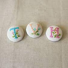 Maybe you would like to learn more about one of these? Rachel S Cross Stitch Fabric Covered Button Tutorial The Village Haberdashery Hoopla Cross Stitch Fabric Cross Stitch Cross Stitch Letters