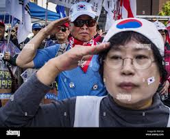 Salute during the national anthem hi-res stock photography and images