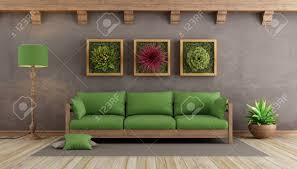Einrichtungstipps grünes sofa inneneinrichtung haus deko grüne wohnzimmer wohnung dekor innenarchitektur grüne wenn dir „grünes sofa gefällt, gefallen dir vielleicht auch diese ideen. Retro Wohnzimmer Mit Brauner Wand Grunes Sofa Und Pflanzen An Der Wand 3d Rendering Lizenzfreie Fotos Bilder Und Stock Fotografie Image 74705496