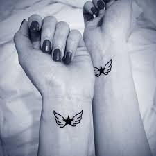 Small Angel Wings Tattoo Idea Ink Girly Small Tattoos Wing Tattoos On Wrist Wings Tattoo