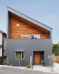 Rumah berbahan dasar kayu dengan cat exterior warna putih ini dari luar tampak sekali bergaya peternakan modern dengan menonjolkan garis vertikal di sekeliling dinding rumah. 15 Desain Rumah Minimalis Tampak Depan Simple Unik Untuk Ditiru