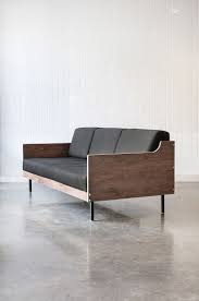 Gus Modern Sleek And Dramatic The Archive Sofa Is A Box Framed Design With A Strong Mid Century Influence Walnut Finish Sofa Design Furniture Sofa Styling