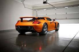 1 5m Gets You A Barely Driven 2005 Porsche Carrera Gt In Arancio Borealis Porsche Carrera Porsche Carrera Gt Porsche