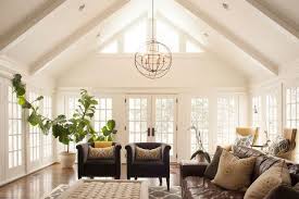 10 Ceiling Styles That Are Most Popular Right Now Cathedral Ceiling Living Room Chandelier In Living Room Ceiling Lights Living Room