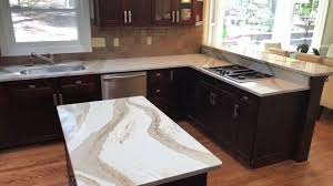 I know one is soft and one is very loud. Cambria Brittanica Gold Quartz Kitchen Countertops Youtube