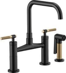 These faucets are said to be first built in the early 1900s and are known to be the first attempt at mixing hot and cold water. Brizo Litze Two Handle Bridge Kitchen Faucet In Matte Black Luxe Gold 62553lf Blgl Ferguson