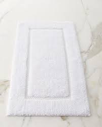 The right bath mat can instantly change the whole look of your bathroom whether you choose a classic style or a contemporary shape like brightly colored round rugs by grund. Bath Rugs Neiman Marcus