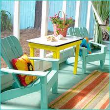 Carpenter gothic balustrades, shutters and light blue ceilings are typical marks of a quintessential key west porch. Coastal Gems Key West Decor Beach Cottage Style Decor Sunroom Decorating