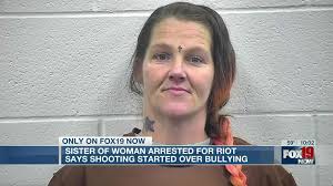 Sister of woman arrested for riot says shooting started over bullying