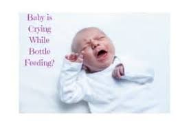 Baby Squirms And Cries While Bottle Feeding Why What To Do Natural Baby Life