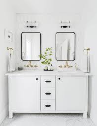 White is also easy to keep clean with bleach and microfiber cloths. Portland Reveal How I Designed A Modern Yet Traditional Guest Bathroom Modern White Bathroom White Vanity Bathroom White Bathroom