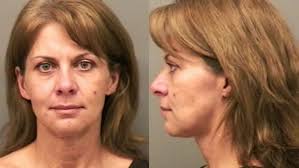 Former city spokeswoman charged with theft from charity