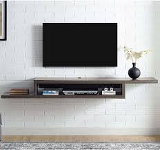 Based on your room decor, you can fix this shelf to a desired height. The Top 10 Best Under Tv Shelves Of 2021