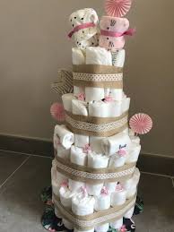 Est une création composée de couches bébé de la marque pampers le tout, assemblés pour donner l'illusion d'une gourmandise que l'on dégusterait avec plaisir. Organiser Une Baby Shower Lady Red Event