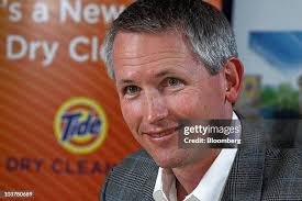 Ed Rider, corporate archivist at Procter & Gamble Co., poses with old...  News Photo