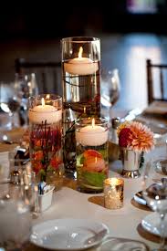 Floating Candle Wedding Centerpiece With Submerged Flowers And Branches Tampa Westsho Candle Wedding Centerpieces Floating Candles Wedding Candle Centerpieces