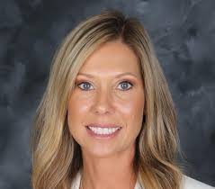 Chris Hampton's base pay set at $189,000.