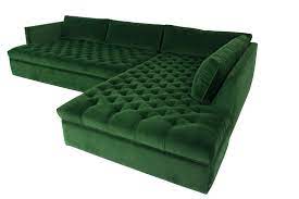 This condo living space showcases bold colors and geometric patterns that create a visually stunning design. Modern Green Velvet Sectional Sofa Modshop