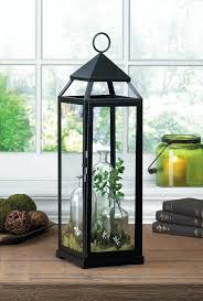 Create A Candlelight Display With This Oversized And Sleek Black Candle Lantern A Perfect Show Stoppe Large Lantern Decor Contemporary Lanterns Lanterns Decor