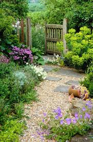 8 Garden Design Features That Will Make The Whole Space Come Together As One Garden Gate Design Small Garden Design Small Cottage Garden Ideas