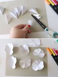Add on the next two largest flower prints on the sides. How To Make A Pop Up Flower Card Liz On Call