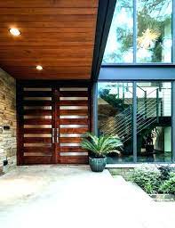 Which brand has the largest assortment of midcentury front doors at the home depot? Double Door Ideas Double Front Door Images Doors Mid Century Modern T Entry Ideas On French Door Treat Modern Front Door Front Door Design Double Door Entryway