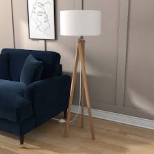 Pair with other modern furniture or let it shine on its own for a striking accent. Wooden Tripod Floor Lamp With White Shade Whenby Furniture123