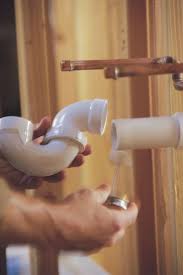 How To Move Sink Plumbing From The Side To The Center Ehow Com Plumbing Bathroom Sink Plumbing Plumbing Emergency