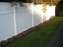 Putting in a fence is a 2 person job Pin By Amber Columbo On Backyard Ideas Vinyl Fence Landscaping Backyard Fences Fence Design
