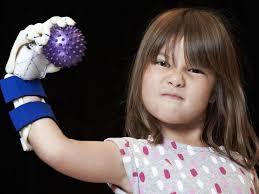Hailey Dawson: Little girl with robotic hand throws first pitch at  Baltimore Orioles game