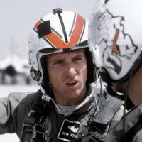 Air Force CAPT. Ronald "Taco" Johnson uses model airplanes to teach a class 