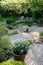 8 Garden Design Features That Will Make The Whole Space Come Together As One Small Garden Design Garden Design Backyard Landscaping