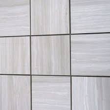 (12x12 with 6x6 or 4x4) i usually set the pattern on a diamond also, we are doing a house right now with slate 12 with 4 (entry)and a bathroom in tumbled mostly 12 and 6 solid porcelain, cut the field tiles down. Haisa Light White Oak Marble 12x12 Polished Tile Tile Mosaic Depot