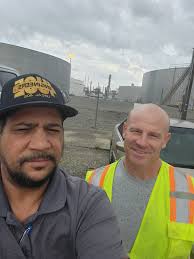 Brother Kyle Bourgeois and Business Agent Miguel Perrault at Shell Norco.