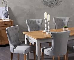Our dining furniture options have you covered, no matter the size and layout of your room or how many people you need to seat. Make Your Dining Area A Comfortable And Stylish Place To Be With The Somerset 180cm Oak And Grey Extending Dining Table With Camille Grey Fabric Chairs Combining An Extending Painted Table With