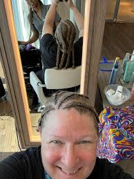 I just got back from Vacation with some cool cornrows. Is there anyone in  Idaho Falls who does these well?
