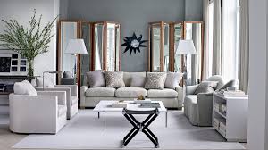 For stunning home decorating ideas white and gray are the main color scheme in this living room while the black curtains and the matching designer light add a this living room chooses a bold color scheme of happy blue teamed with red sofas and brown. Inspiring Gray Living Room Ideas Architectural Digest