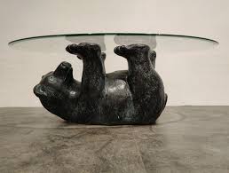 For all you fishermen out there, don't forget to browse through our fishing decor to spruce up your home. Unique Sculptural Black Bear Coffee Table 1970s 154746