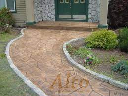 Arizona Flagstone Pattern Stamped Concrete Walkway With Cobblestone Curbing Cobblestone Walkway Stamped Concrete Walkway Outdoor Walkway