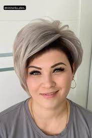 Short Ash Blonde Hairstyle With Dark Roots