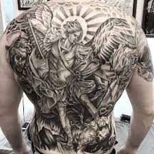 This meaningful tattoo idea allows you to display your bravery and determination to combat evil spirits. Saint Michael Tattoo St Michael Tattoo Archangel Tattoo Archangel Michael Tattoo