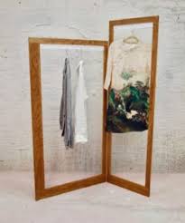 This minimalist coat rack is made of concrete and wood. Wall Hanging Coat Rack Hallway Design Tidyboy