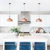 Guest picks dashing lighting for over the kitchen island. 1