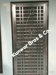 All designs aside, nothing makes a statement first impression like this red metal door! We Are One Of The Best Stainless Steel Doors Manufacturer In Noida And Delhi Ncr More Information Please Call Steel Door Design Steel Front Door Door Design