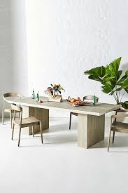This bold combination of solid concrete and blackened wrought iron imparts a fresh, contemporary style. Concrete Indoor Outdoor Dining Table Anthropologie