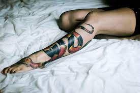 Legs are the sexiest part of the women's body. Glossy Snake Lower Leg Tattoo Snake Tattoo Snake Tattoo Design Traditional Snake Tattoo