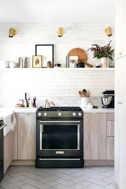 This sleek farmhouse kitchen integrates the hardware, storage cabinets, and the appliances into the walls. Top 50 Pictures Small Kitchen Design Images With White And Gray Colour Combinations Of Small Kitchen Design Ideas Compact But Stylish Picsbrowse Com